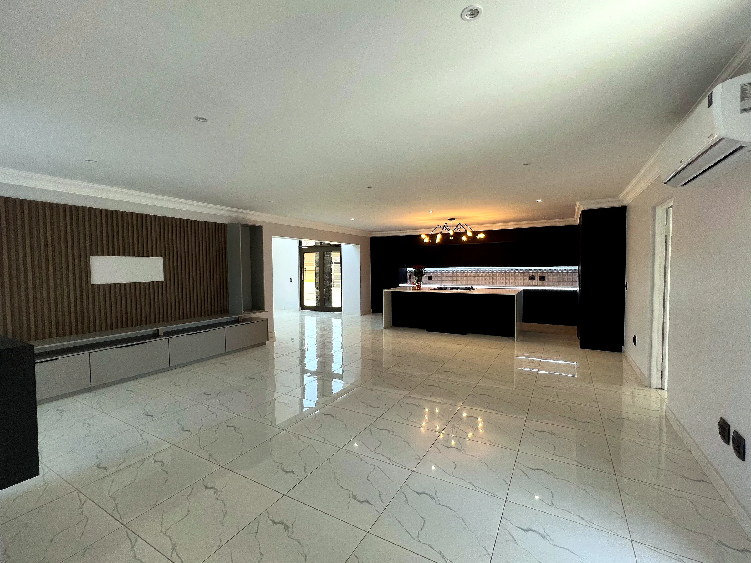Refined family residence kitchen and living area